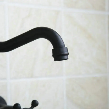 Vintage black swivel wall mounted bathroom faucet with black matte finish ceramic base and curved spout by decorbites black swivel