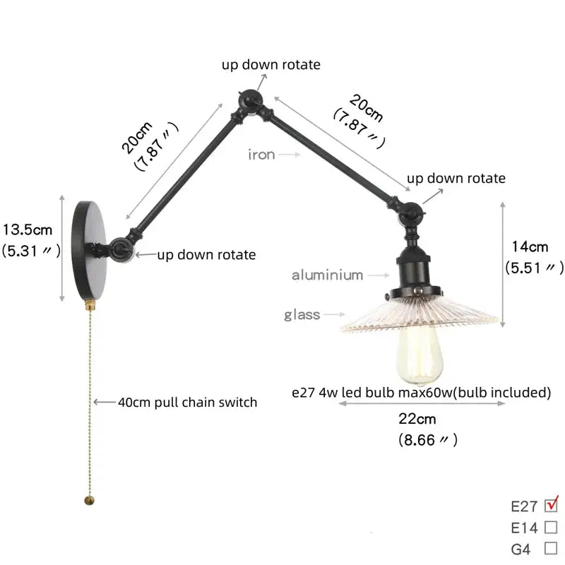 Black vintage wall lamp with adjustable iron and aluminum arms and clear glass shade over exposed Edison bulb