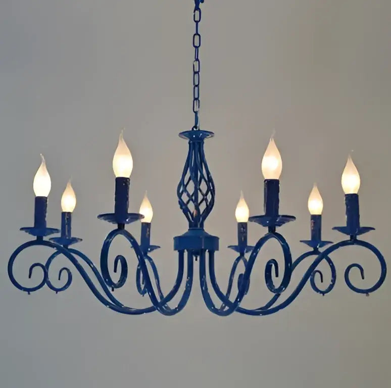 Vintage blue metal crystal chandelier with ornate scrollwork and candle-style bulbs for dining room decorbites blue metal