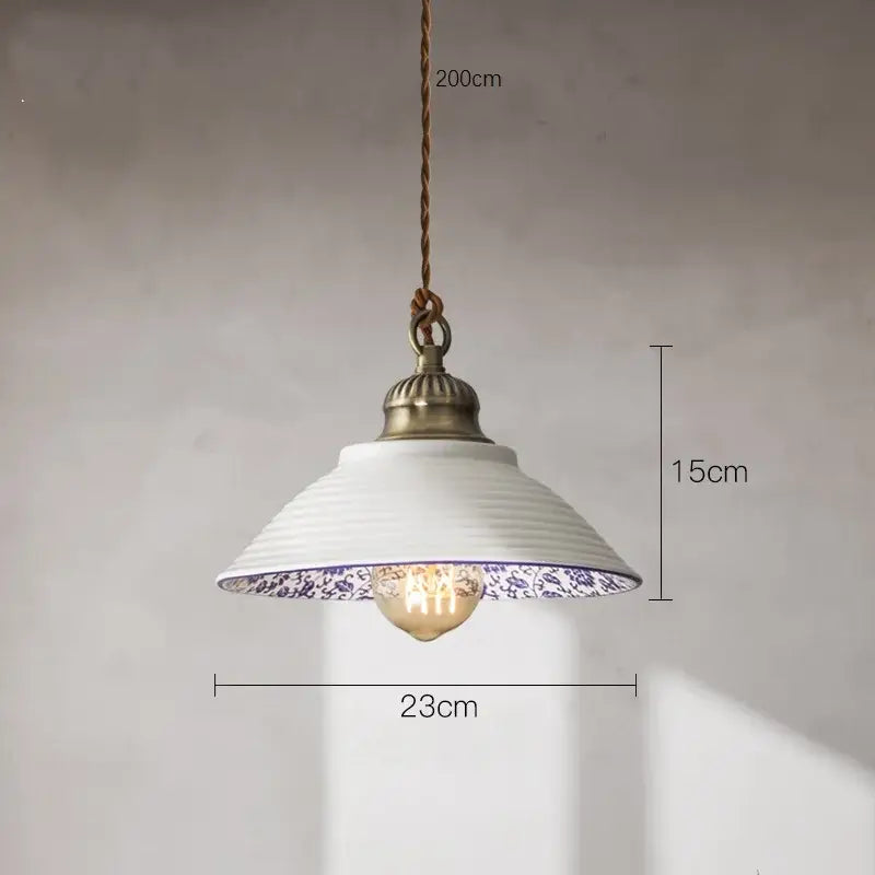White ceramic vintage pendant light with blue floral pattern and antique brass fixture for kitchen decorbites ceramic vintage hanging