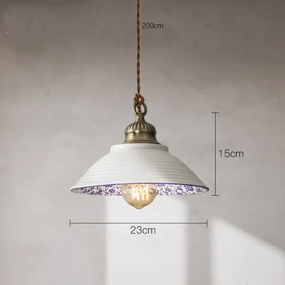 White ceramic vintage pendant light with blue floral pattern and antique brass fixture for kitchen decorbites ceramic vintage hanging
