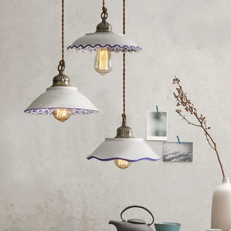 Three white ceramic pendant lights with purple scalloped edges and brass hardware for decorbites ceramic vintage hanging decor