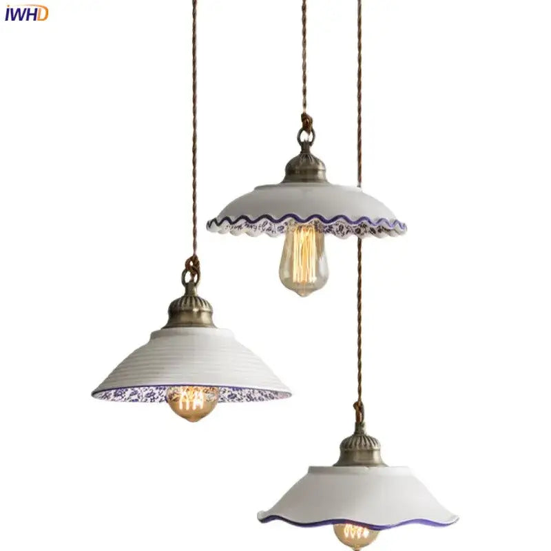 Three white ceramic vintage pendant lights with blue floral patterns and brass fixtures for kitchen hanging decorbites ceramic vintage hanging