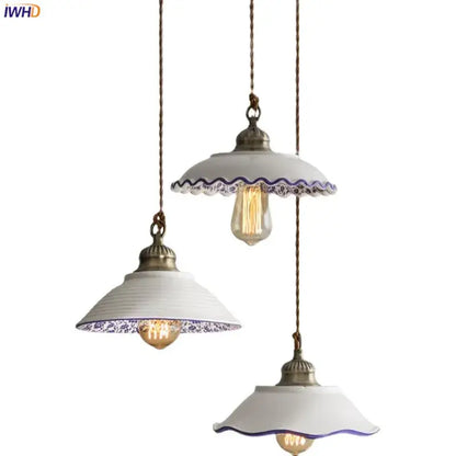 Three white ceramic vintage pendant lights with blue floral patterns and brass fixtures for kitchen hanging decorbites ceramic vintage hanging