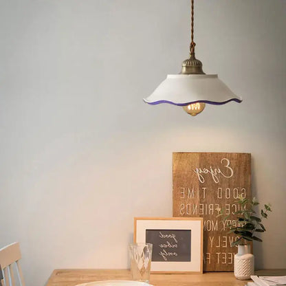 White ceramic pendant lights with scalloped edge purple trim and exposed brass fixture for ceramic vintage hanging decor