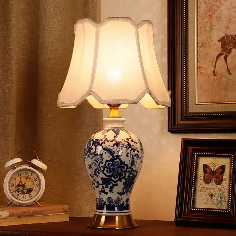 Vintage blue and white porcelain table lamp with scalloped cream shade ideal for bedroom decorbites blue white decor