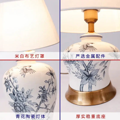 White porcelain table lamp with decorbites blue white floral hand-painted design and gold-toned metal accents