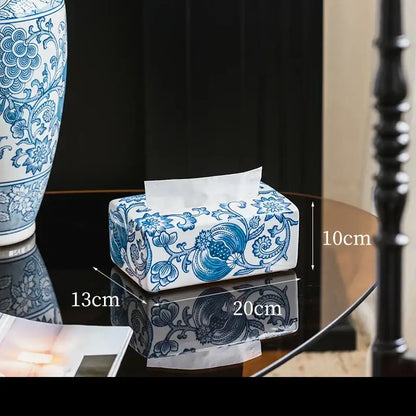 Vintage blue and white porcelain tissue box with intricate floral patterns for living room decor