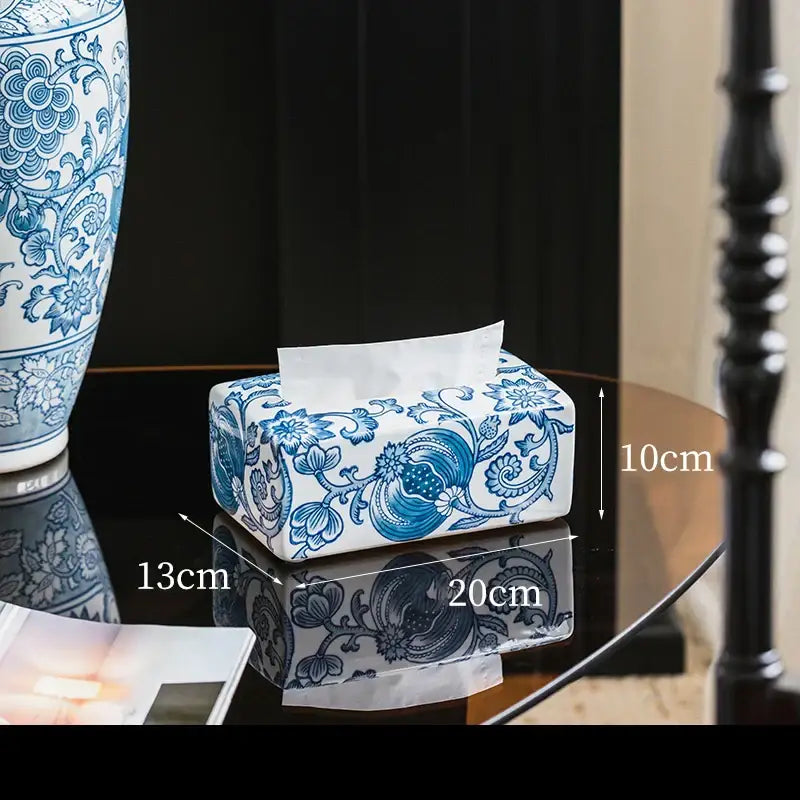 Vintage blue and white porcelain tissue box with intricate floral patterns for living room decor