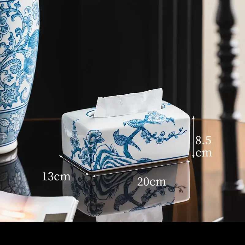 White ceramic porcelain tissue box with blue floral and bird design for vintage living room decor