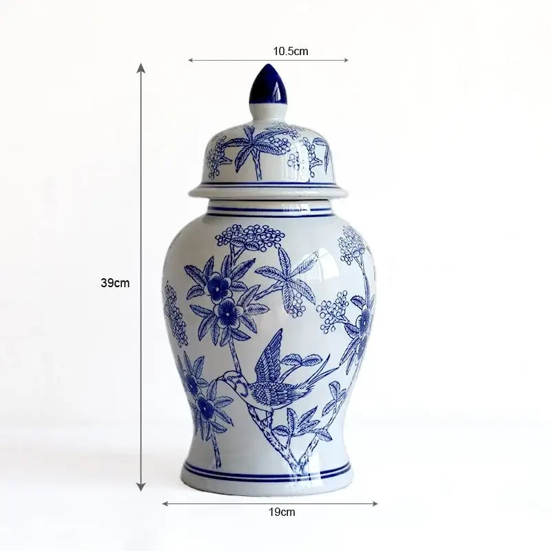 A vintage blue white porcelain vase with intricate floral and bird motifs for living room decorbites blue white jar