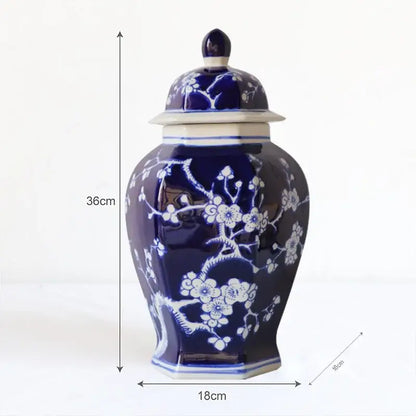 A glossy deep blue porcelain vase with white plum blossom decorbites blue white patterns for living room decor