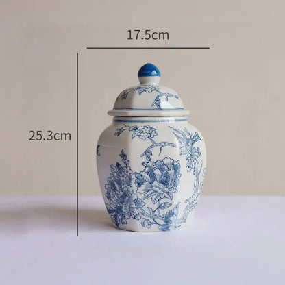 A white porcelain vase with intricate blue floral and bird patterns for living room decorbites blue white style