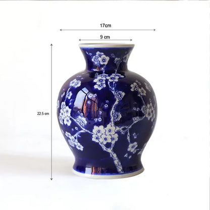 Deep blue porcelain vase with delicate white plum blossom patterns for vintage blue white decorbites living room decor