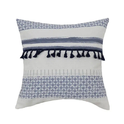A vintage blue and white tassel pillow cover with horizontal blue stripes and black tassels for living room decorbites decor