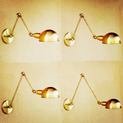 Vintage brass adjustable long arm wall light with dome-shaped brass-finished lampshade for elegant bedroom decorbites wall light