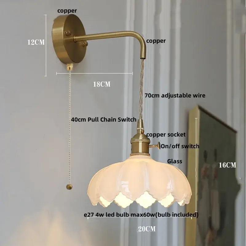Vintage brass amber coffee glass wall sconce with antique brass finish, petal-shaped frosted shade, and adjustable copper wire