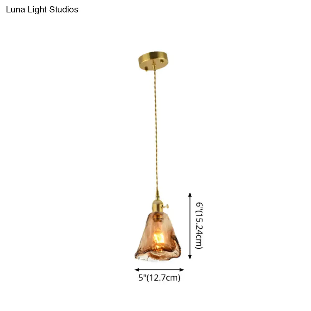 DecorBites brass shaded drop pendant light with warm amber tan glass and brass-finished metal fixture for living room