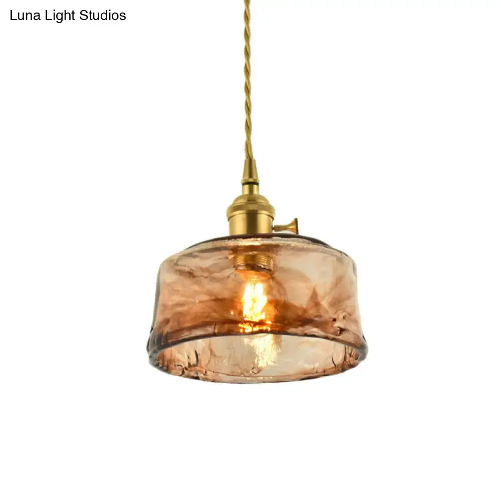 DecorBites™ pendant light with warm amber tan glass textured finish and brass shaded drop for living room use