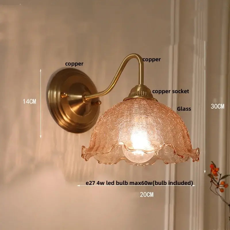 Vintage brass and amber glass wall sconce with textured amber glass shade and ruffled edges for bedroom vanity decorbites amber glass