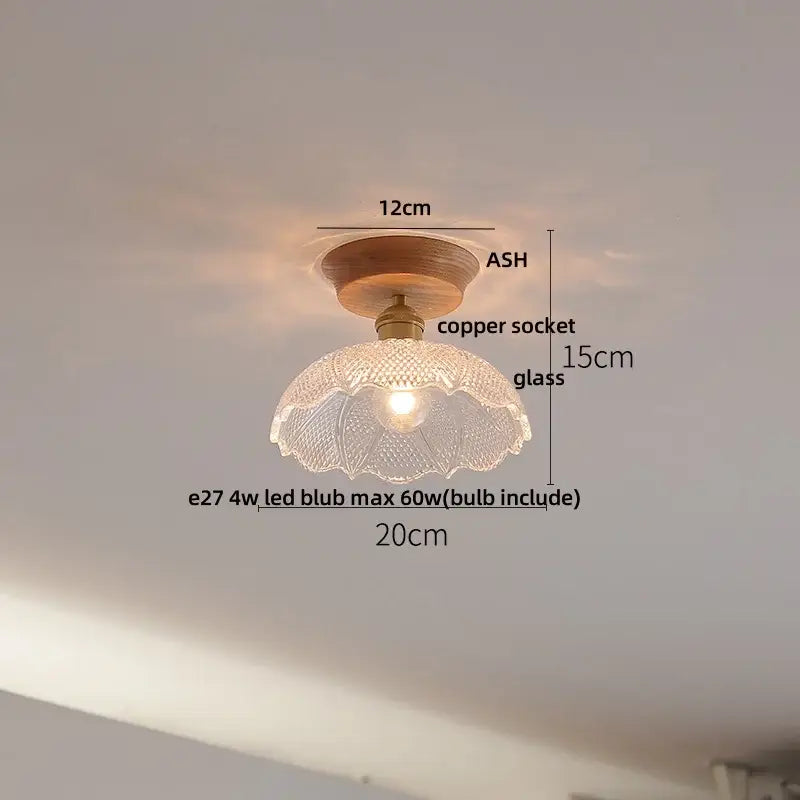 Vintage brass and clear glass led ceiling light with a scalloped clear glass lampshade on ash wood base for bedroom decorbites
