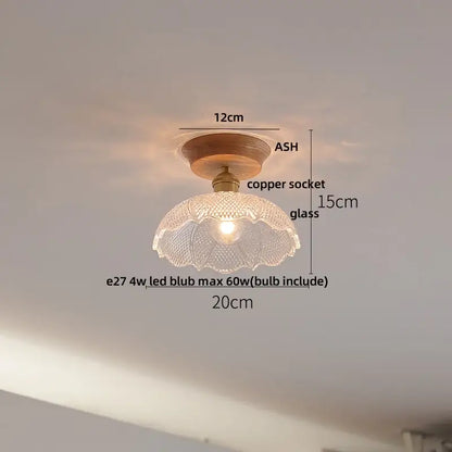 Vintage brass and clear glass led ceiling light with a scalloped clear glass lampshade on ash wood base for bedroom decorbites