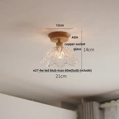 Vintage brass and clear glass led ceiling light with a delicate fluted decorbites clear glass pendant and copper socket on ash wood base