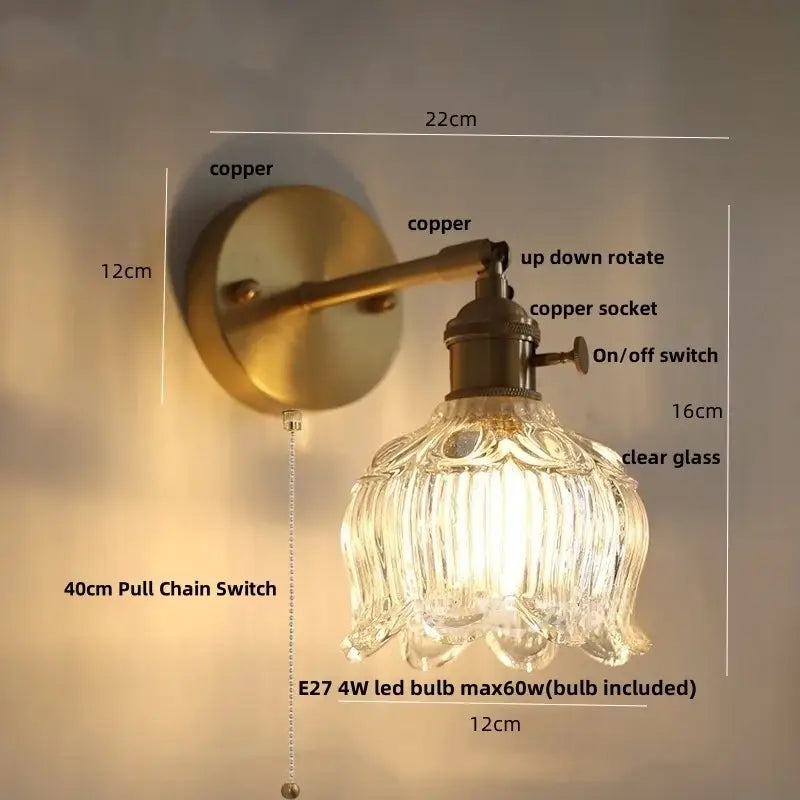 Vintage brass wall lamp with clear ribbed glass shade and 40cm pull chain switch for bedroom use