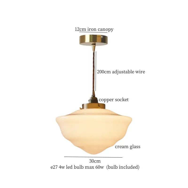 Vintage pendant light featuring cream glass ball with brass iron canopy and copper socket for kitchen decorbites cream glass