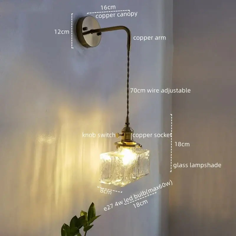 Vintage brass and glass led wall lamp with antique brass-finished copper and faceted clear glass lampshade
