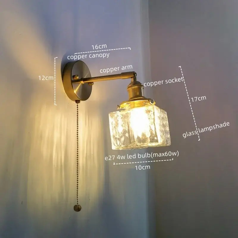 Vintage brass and copper finished led wall lamp with textured glass lampshade and pull chain for bedroom lighting