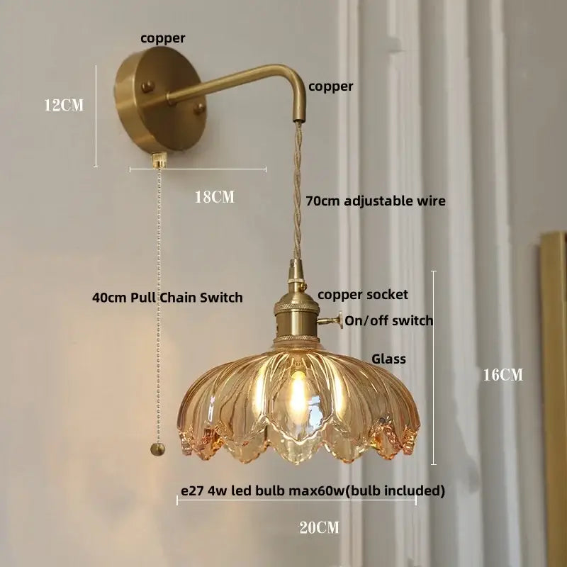 Vintage brass wall lamp featuring an antique brass finish, green glass led shade, and adjustable copper wire arm