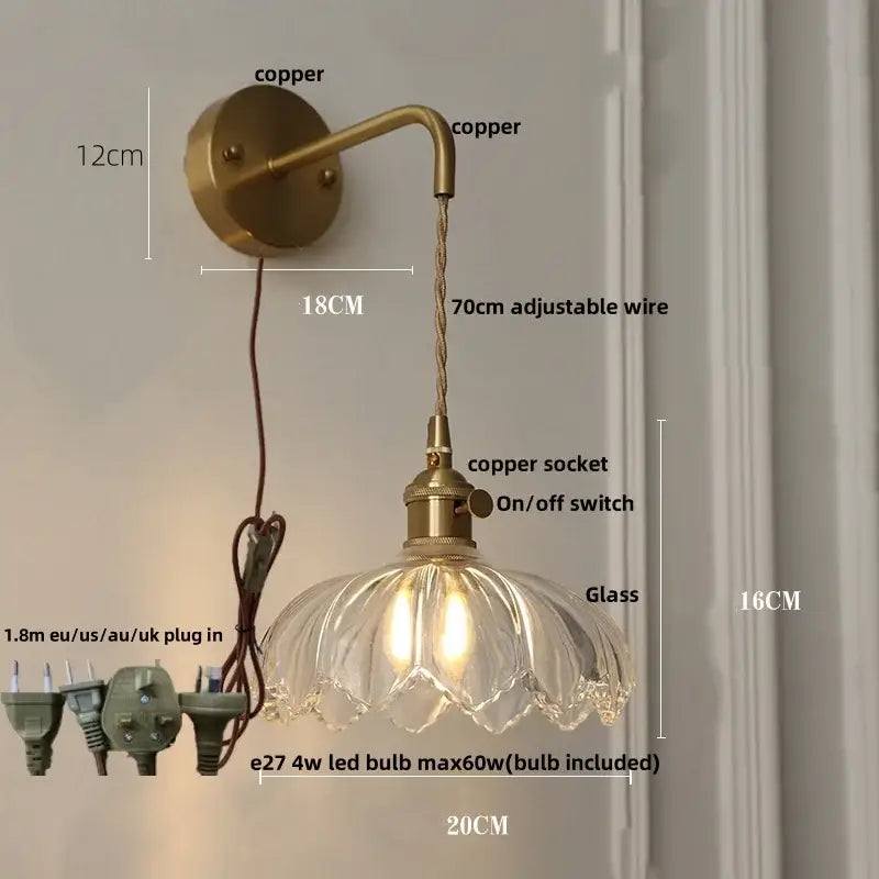 Antique brass-finished wall lamp with adjustable copper wire and clear fluted green glass led shade for bedroom lotus light