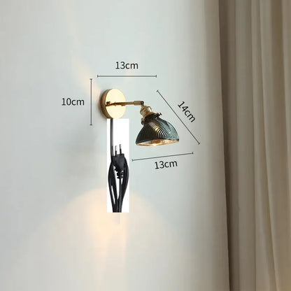 Vintage brass and green glass led wall lights with articulated arm and ribbed shade for bedroom wall lighting