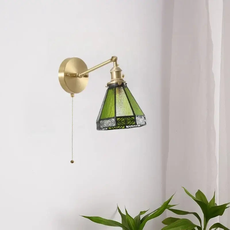Vintage brass and green glass led wall sconce with pull chain designed for bedroom lighting decor