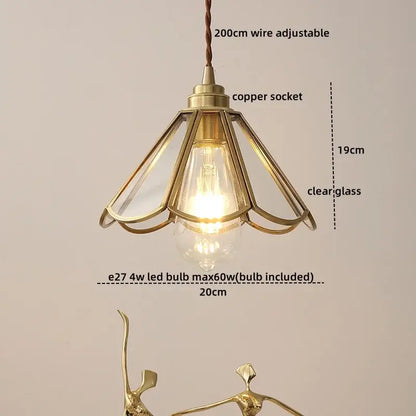 Vintage brass pendant light with clear glass panels and visible blue glass led bulb for bedroom decorbites decor