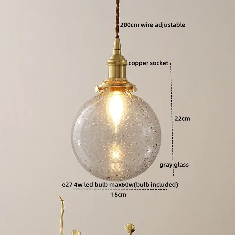 Vintage brass and gray glass pendant light with textured bubble surface and copper socket for bedroom decorbites blue glass decor