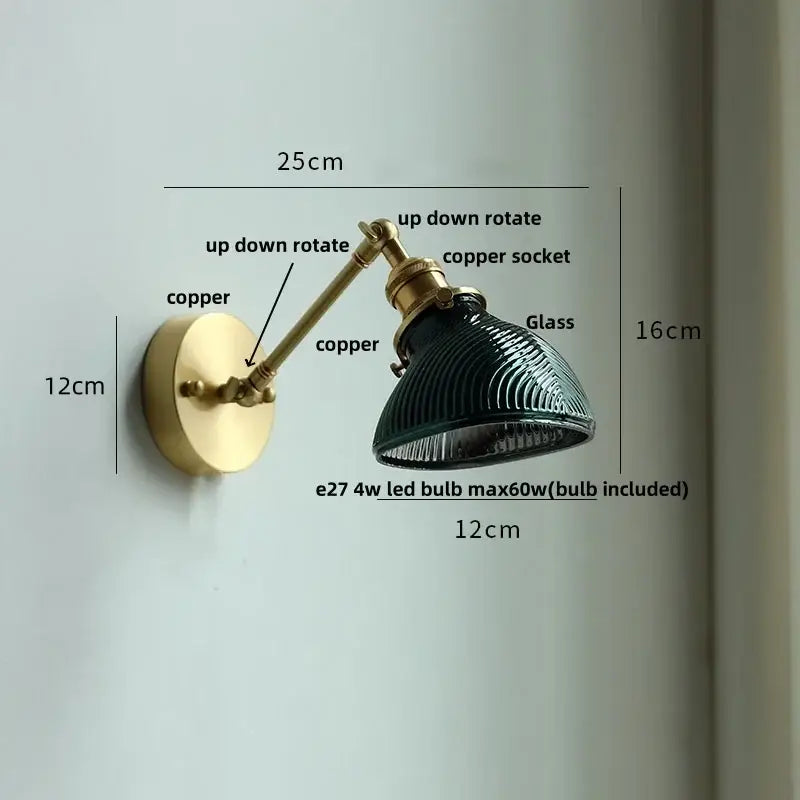 Vintage brass and green glass wall light fixture with a dark green ribbed glass shade for bedroom use