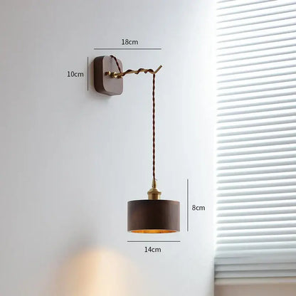 Dark brown wooden wall sconce with twisted brass chain and gold metal accents for decorbites led wall sconce lighting