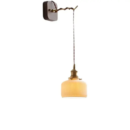 Vintage brass and ribbed glass led wall sconce with warm amber shade for bedroom decorbites led wall lighting
