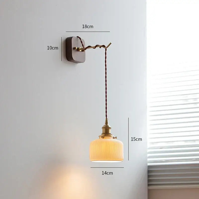 Warm-toned ribbed glass led wall sconce with brass finish and twisted brown cord for vintage bedroom decorbites led wall use