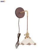 Vintage brass wall sconce with scalloped off-white glass shade featuring metal arm for bedroom decorbites ceramic wood led lighting