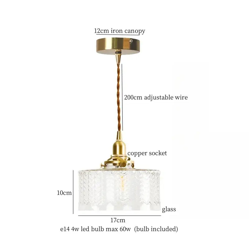 A vintage brass and textured glass led pendant lamp with copper socket for dining room lighting