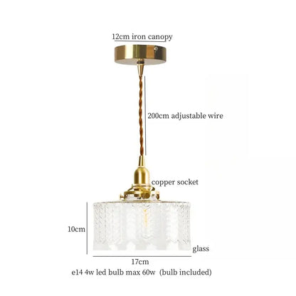 A vintage brass and textured glass led pendant lamp with copper socket for dining room lighting