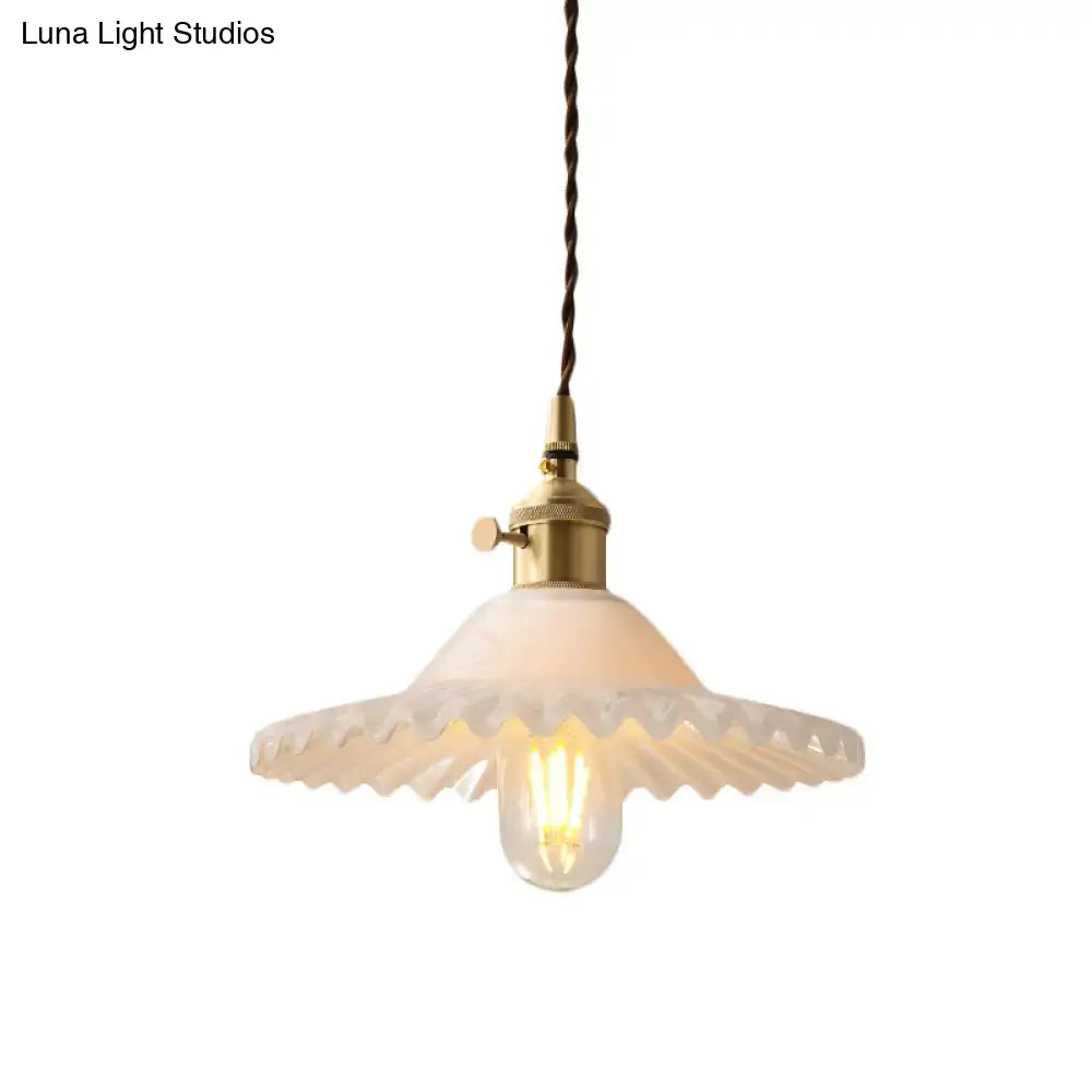 DecorBites™ Chloe scalloped pendant light with industrial brass fixture and off-white frosted glass shade