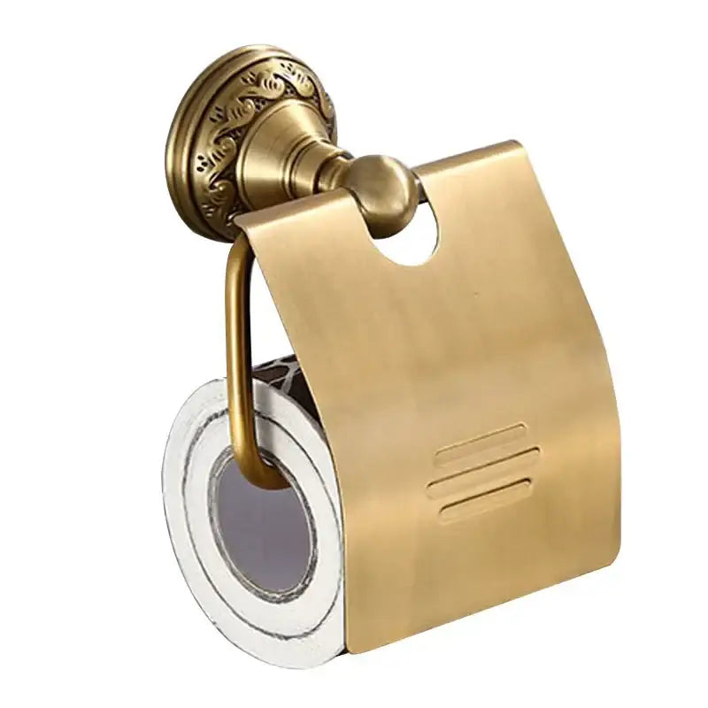 Antique brass toilet paper holder with ornate wall mount and brushed metal cover in decorbites brass bathroom set