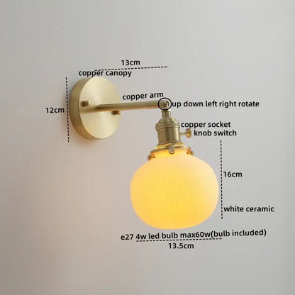 A warm glowing white ceramic led wall light with brass finished copper arm for elegant decorbites ceramic led decor