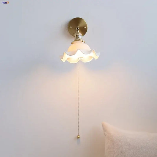 Vintage brass ceramic led wall lights with a brass base and off-white ruffled glass shade for bedroom decorbites ceramic led wall
