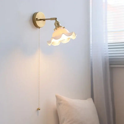 Gold-toned vintage brass ceramic led wall lights with delicate ruffled glass shade and elegant pull-chain switch for decorbites ceramic led wall
