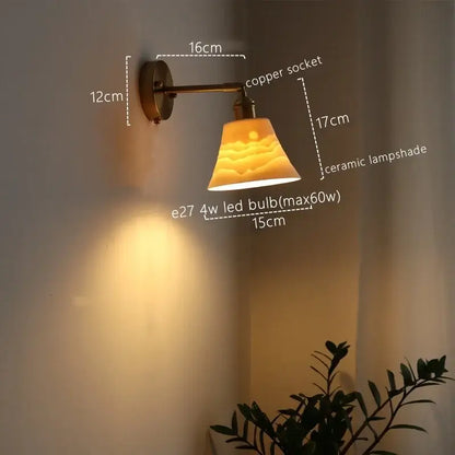 Copper-finished vintage brass ceramic led wall sconce with a sunrise ceramic lampshade for bedroom decorbites ceramic led wall
